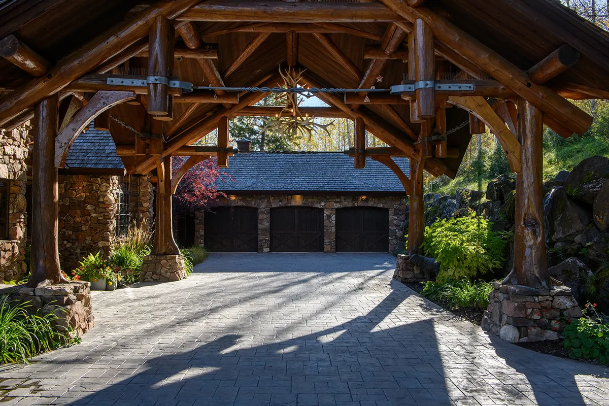 Covered Driveway and 3-Bay Garage Entry